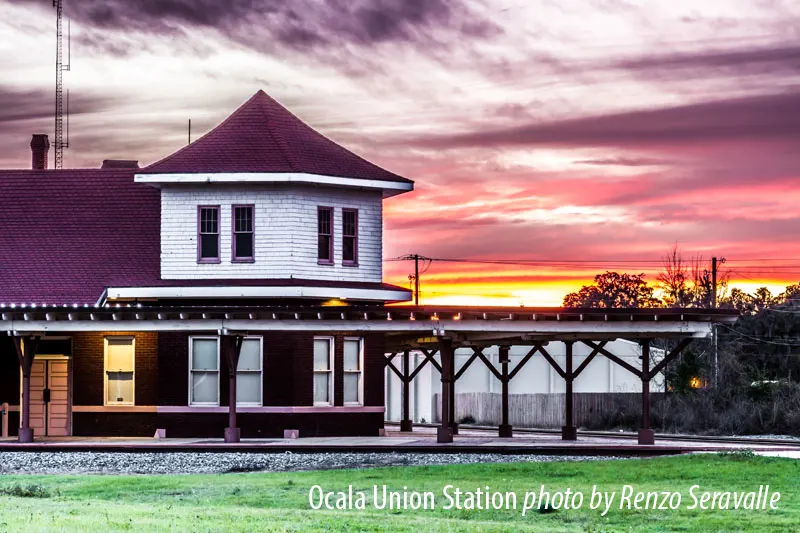 The station's tower and platform canopy at sunset